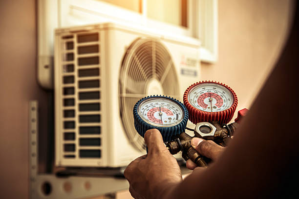Professional Hvac Installation technician working in Fayville, MA